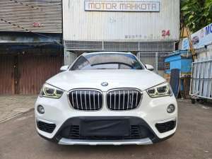 Jual bekas Full cat ori BMW X1 sdrive 1.8i panoramic 2019 nik 2018 putih 44 rb km,lokasi di Jakarta Pusat
