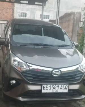 Jual bekas Sigra R facelift coklat metalik,lokasi di Bandar Lampung Kota
