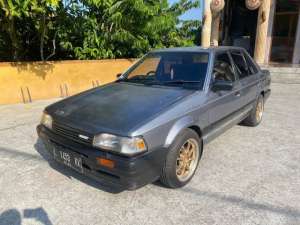 Jual bekas mazda 323 1988 winda bisa tukar tambah sekoto badas,lokasi di Kediri  Kab.