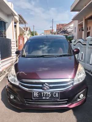 Jual bekas Suzuki New Ertiga Tife GL Matic Thn 2016 Warna Merah metalik,lokasi di Bandar Lampung Kota