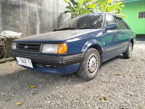 Jual bekas ford laser biru 86,lokasi di Purworejo Kab.