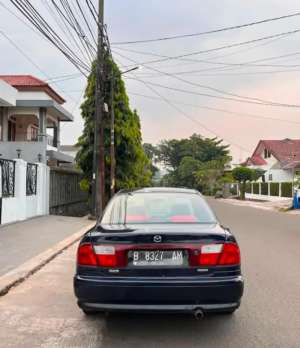 Jual bekas Mazda familia 1999 manual,lokasi di Bekasi Kab.