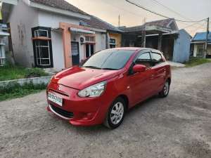 Jual bekas Mitsubhisi Mirage Tahun 2014 manual,lokasi di Makassar Kota