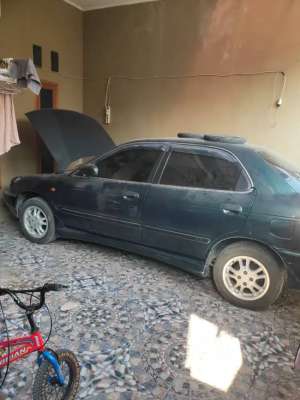 Jual bekas Suzuki Baleno DX 1.6 MT 1999 Hijau MetalikBonud Drone FPV,lokasi di Bekasi Kab.