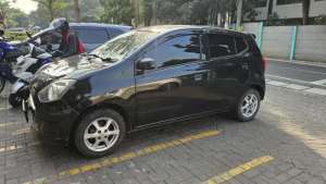 Jual bekas Ayla hitam murah,lokasi di Jakarta Barat