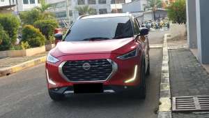 Jual bekas Km 36rb nissan magnite premium turbo cvt two tone 2022 merah,lokasi di Jakarta Utara