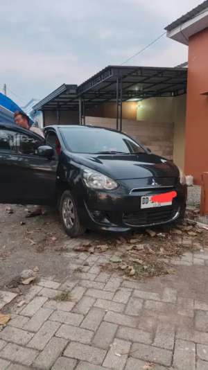 Jual bekas Mitsubishi Mirage 1.2 Manual 2014 km 73.000,lokasi di Gowa Kab.