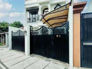 rumah bergaya eropa di condet jaktim, rooftop luas ada swimming pool anak dan area bermain lokasi di Jakarta Timur, tersedia melalui melalui situs Olx